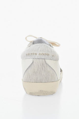 Flache SUPER-STAR DOUBLE QUARTER Sneaker aus Leder mit Vintage-Effekt und Ponyfell-Detail