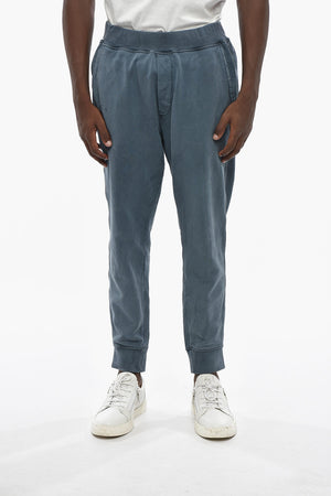Joggers in Cotone Garzato con Design Distressed