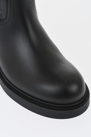 Leather Boots With All-Over Embossed Monogram