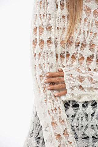 Lightweight Top with All‑Over Cut‑Out Details