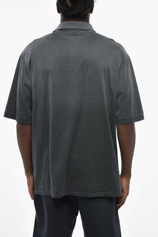 Loose-Fit Polo mit Used-Effekt und besticktem Logo