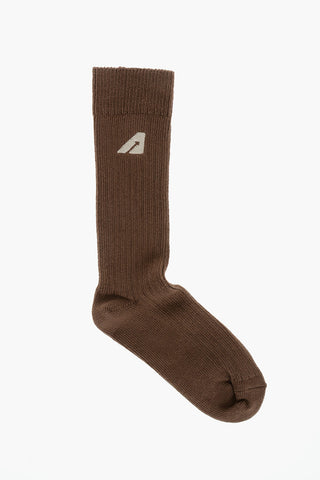 Lange einfarbige Socken mit gesticktem Detail