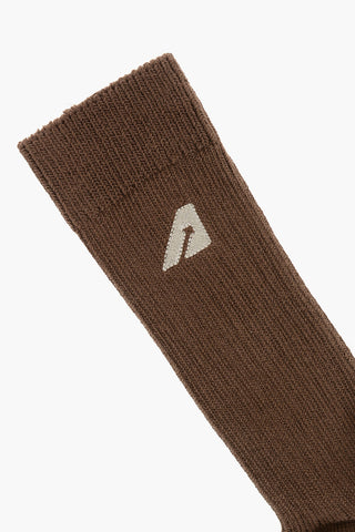 Lange einfarbige Socken mit gesticktem Detail