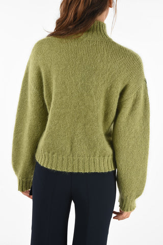 maglia collo alto con Ricami
