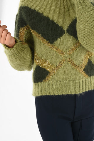 maglia collo alto con Ricami