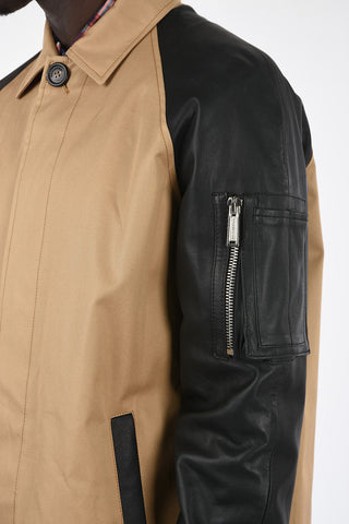 cappotto balmacaan con applicazioni in pelle
