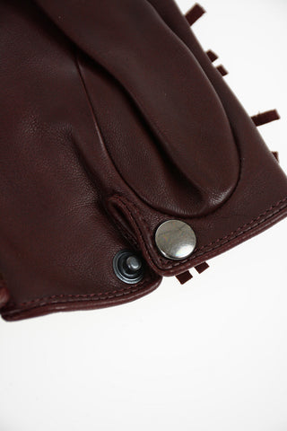 fringed leather gloves