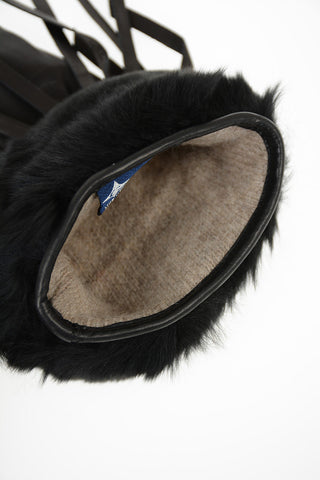 Guanti con frange in pelle e in pelliccia