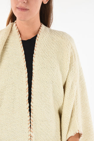 fringed knit cape