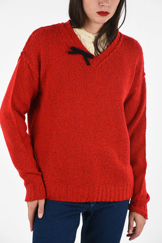 Oversized v-neck sweater with bow