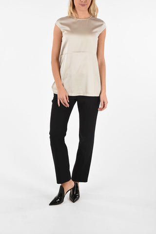 Sleeveless top with zip closure on the back