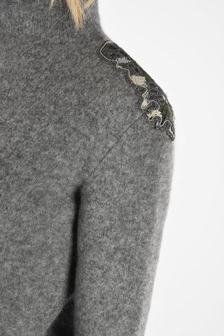 Embroidered turtle-neck sweater