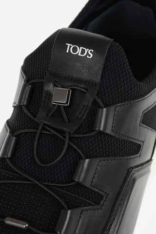 Sneaker in pelle scamosciata e Tessuto
