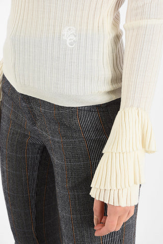 Ribbed Turtleneck Sweater with frill cuff