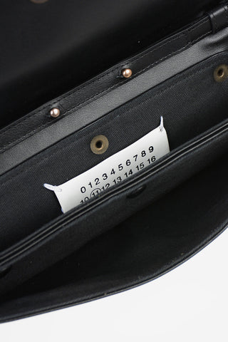 MM11 Laminate Leather Pochette
