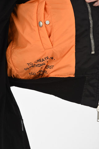 Distressed waist length bomber