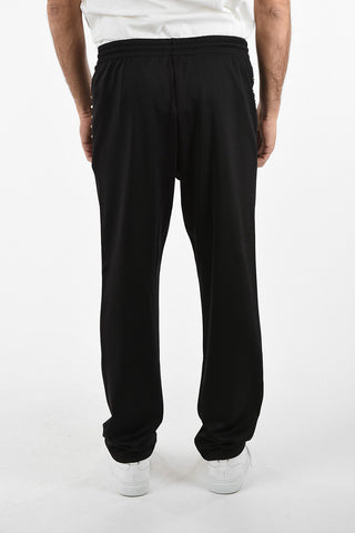 ROCKSTUDIO UNTITLED Jogger con Borchie