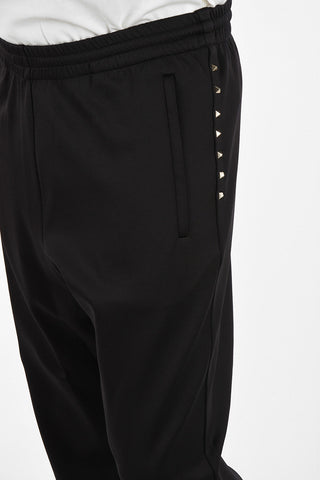 ROCKSTUDIO UNTITLED Jogger con Borchie