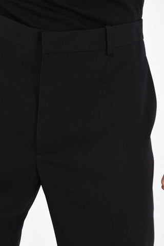 single pleat trousers