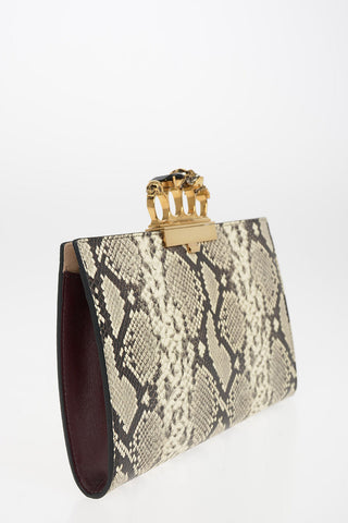Snake printed FOUR RING Clutch
