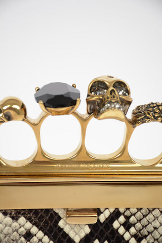 Snake printed FOUR RING Clutch