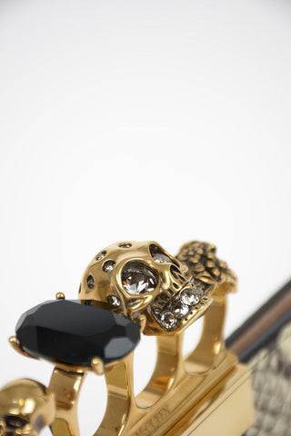 Snake printed FOUR RING Clutch
