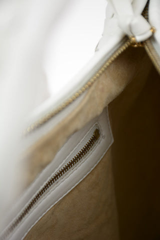 Shoulder bag in braided leather