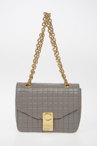 Mini Bag Top Handle in Pelle Matelassè con Catena Regolabile