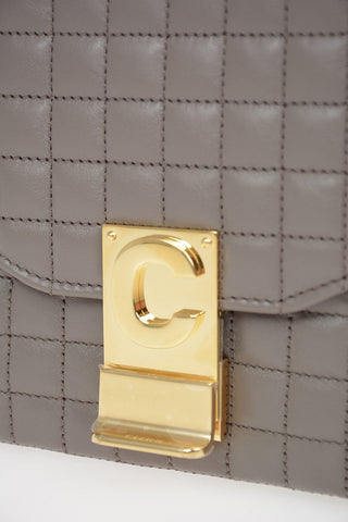 Mini Bag Top Handle in Pelle Matelassè con Catena Regolabile
