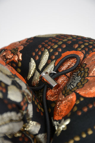 Padded brocade Trapper