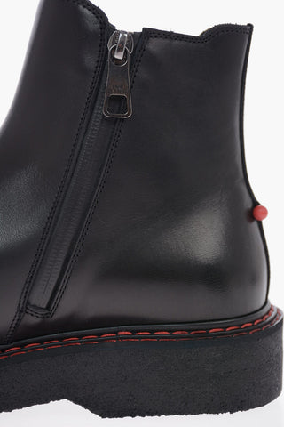 Leather PIERCED MONOGRAM Chelsea Boots 