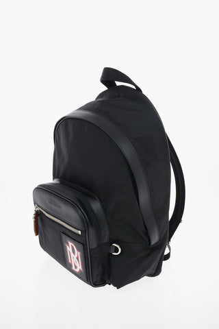 Fabric PIERCED MONOGRAM VARSITY Backpack with Leather Details