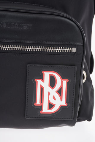 Fabric PIERCED MONOGRAM VARSITY Backpack with Leather Details