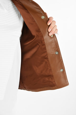 MM6 SLEEVELESS LEATHER JACKET WITH SNAP BUTTONS