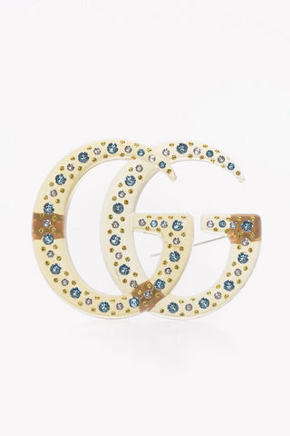 Spilla Logo con Strass