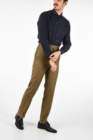 pantalone a una pince a vita alta e tasca diagonale