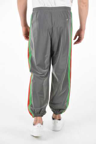 Joggers in Tessuto Rifrangente con Bande Iconiche a Contrasto