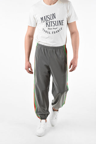 Joggers in Tessuto Rifrangente con Bande Iconiche a Contrasto