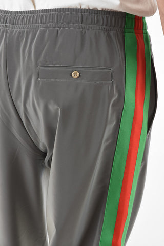 Joggers in Tessuto Rifrangente con Bande Iconiche a Contrasto