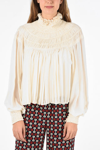 silk and ruffled top