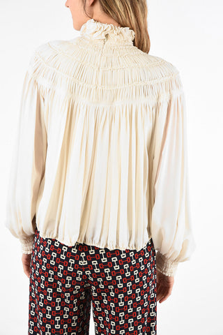 silk and ruffled top