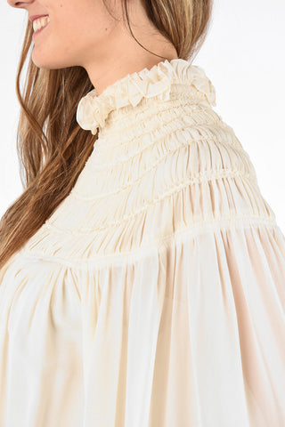silk and ruffled top