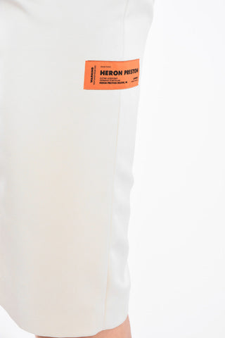 split-back hem below knee skirt