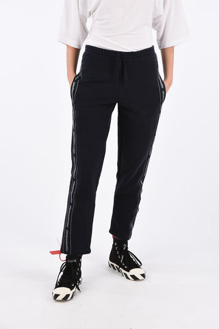 pantalone jogger con bandala laterale logata