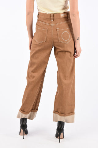 pantalone ad orlo con risvolto