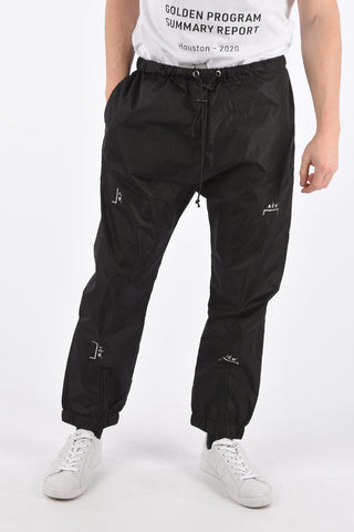 Pantalone con Elastico in Vita e Zip alla Caviglia
