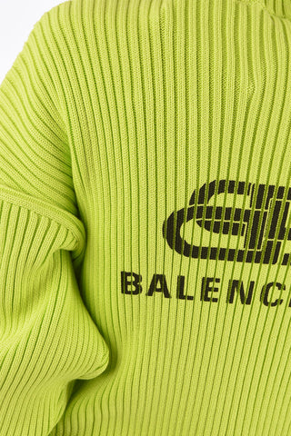 maglia a coste collo alto oversize fit
