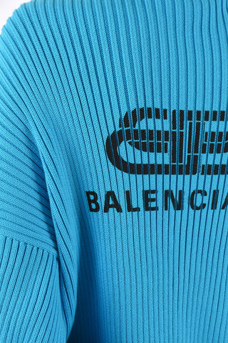 maglia a coste collo alto oversize fit