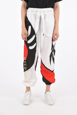 PYER MOSS Joggers SANKOFA con Stampe