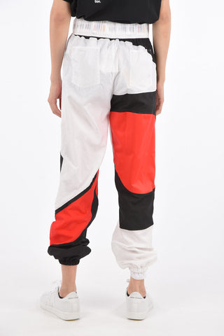 PYER MOSS Joggers SANKOFA con Stampe